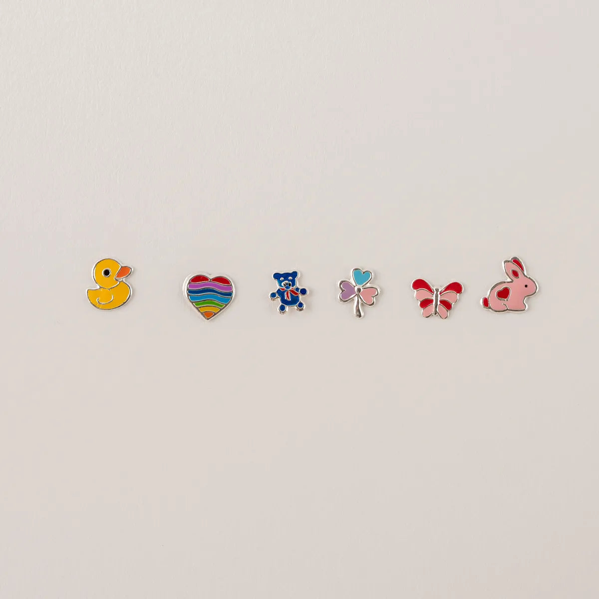 Stekertjes in zilver: eendje hartje, beertje,...