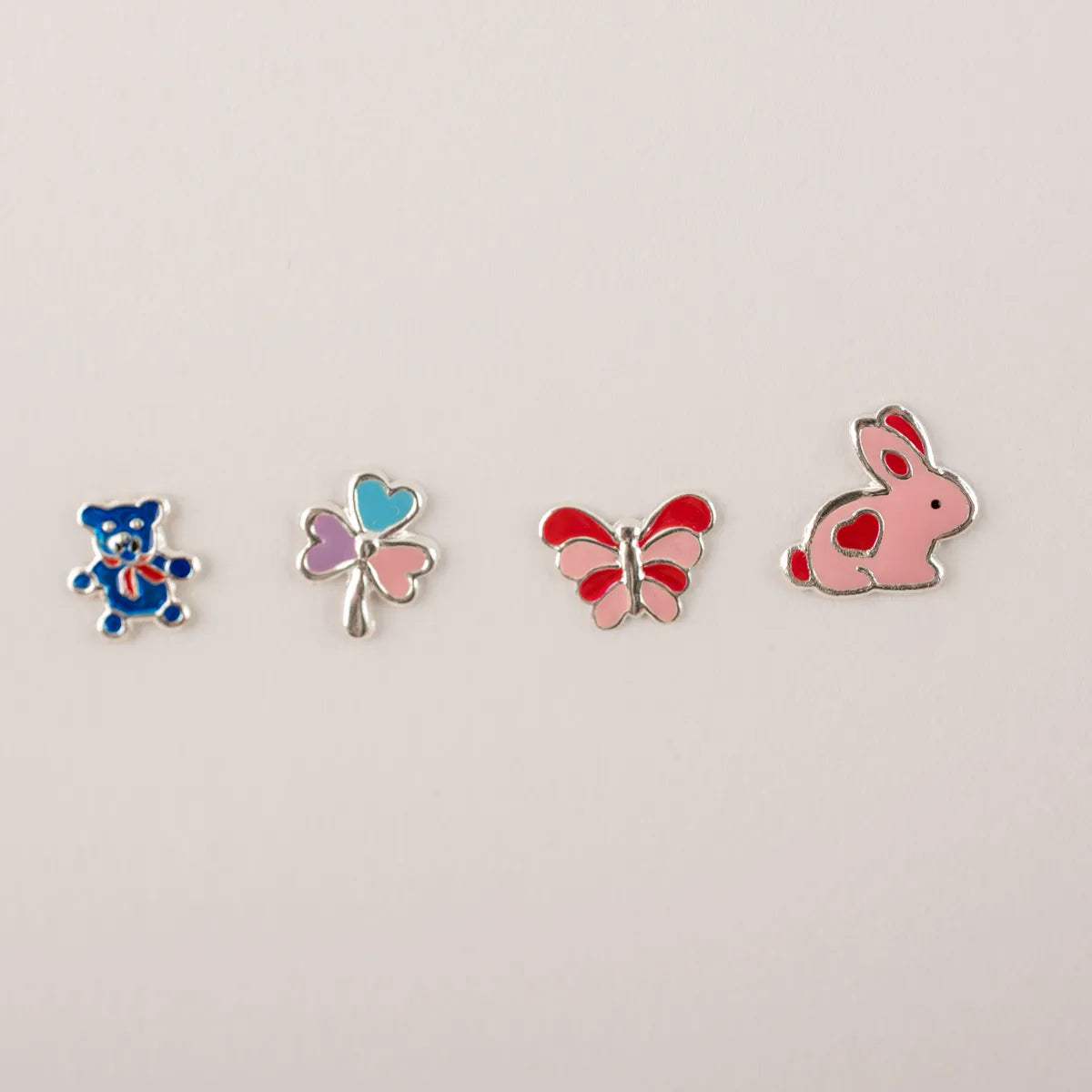 Stekertjes in zilver: eendje hartje, beertje,...