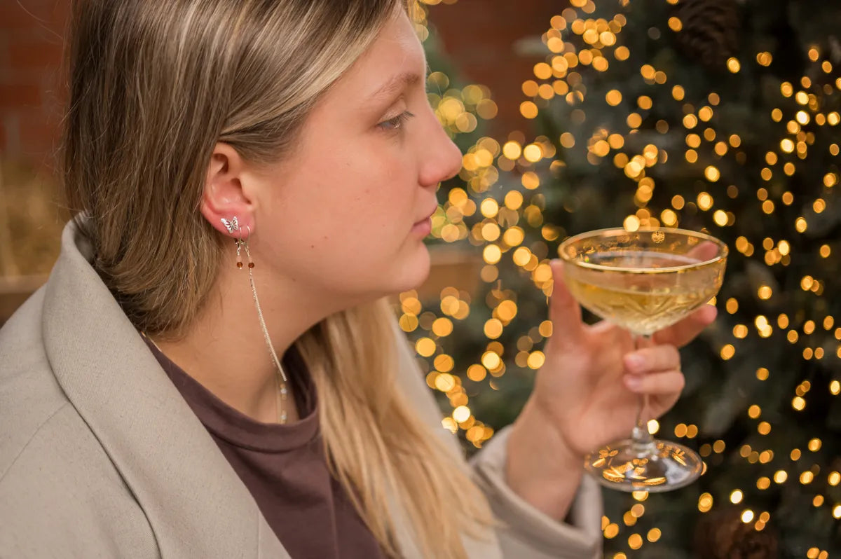 Stekertjes in zilver: strikje, parel, vlinder...